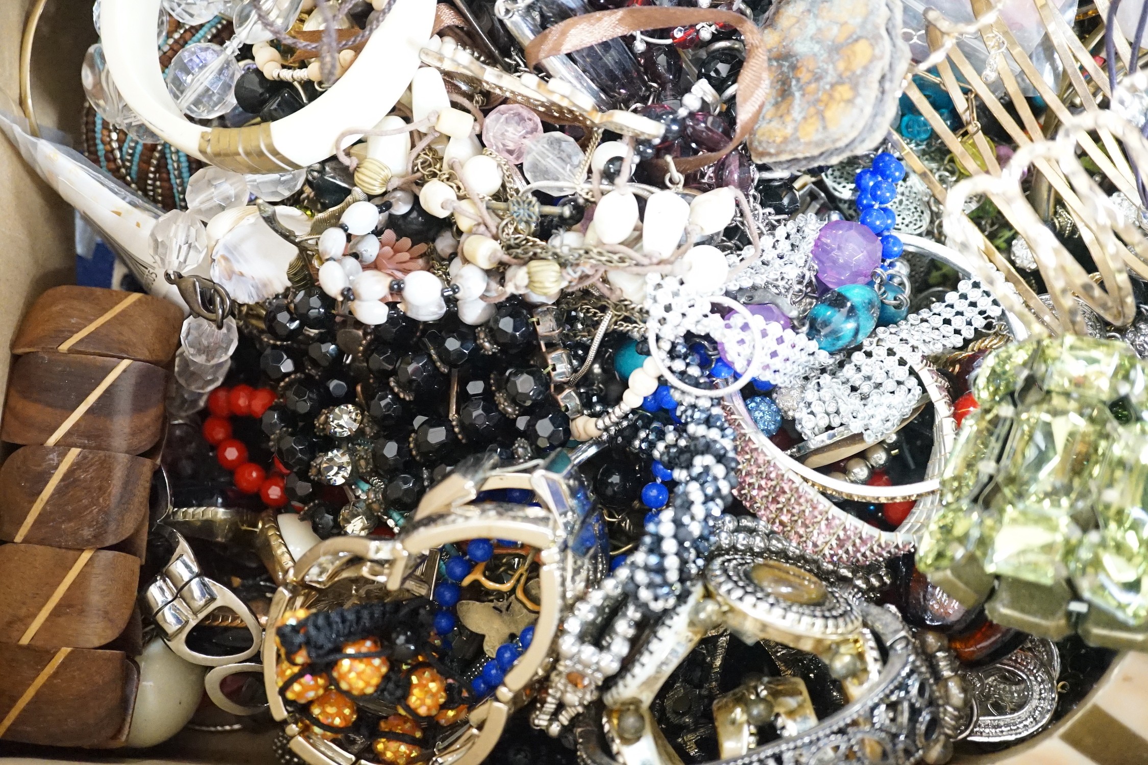 A large quantity of assorted bangles and other costume jewellery.
